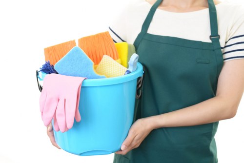 Commercial cleaning team working in a Camden office reception area
