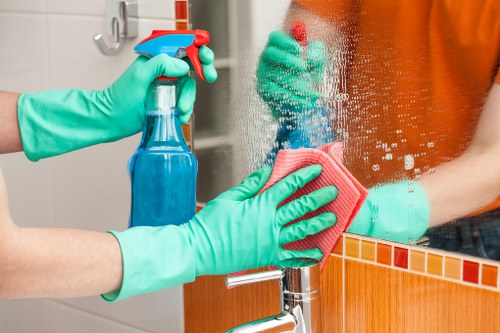 Staff member handling a carpet cleaning complaint professionally