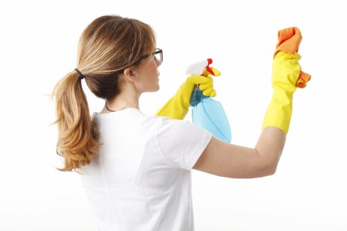 Technician treating a carpet stain in a Camden apartment