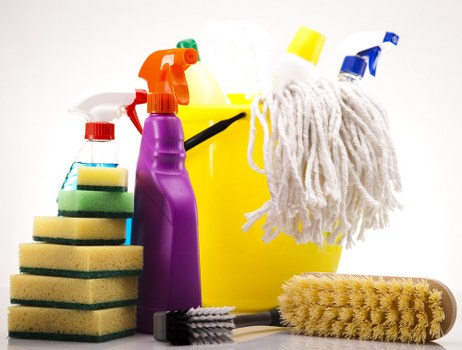 Technician checking cleaning products and surface safety